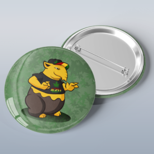 Photo of a button with art of the Pokémon Drowzee wearing a shirt and hat with a marijuana leave and the text "420".