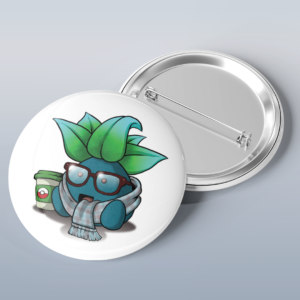 Photo of a button with art of the Pokémon Oddish as a hipster wearing a scarf, glasses, and holding a coffee cup.